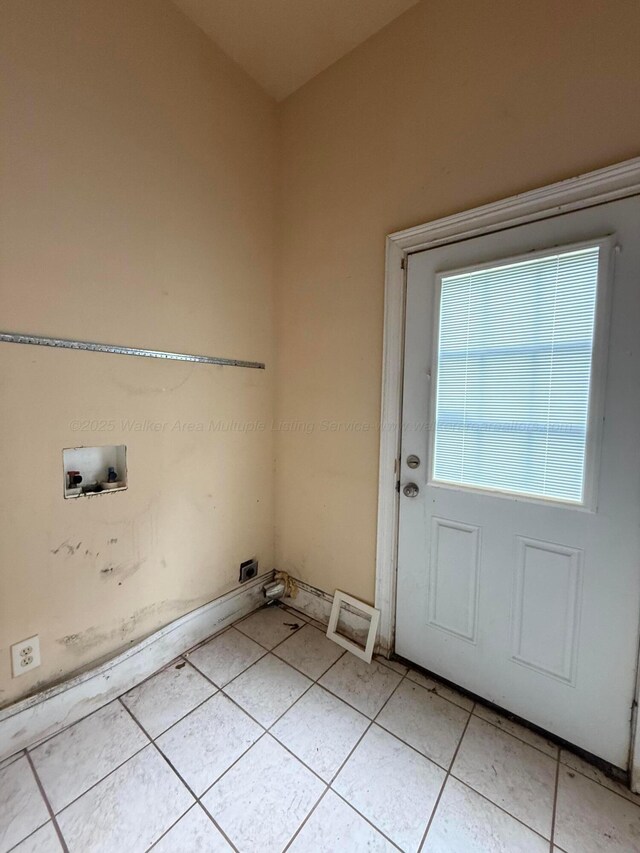 1068 Old Zion Loop, Nauvoo, AL 35578 - laundry room with washer hookup and light tile patterned flooring