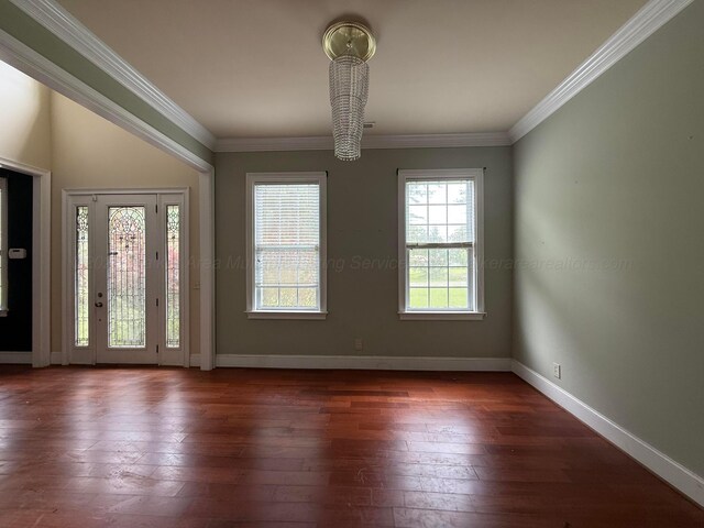 1068 Old Zion Loop, Nauvoo, AL 35578 - foyer entrance featuring a chandelier, crown molding, and dark wood-style floors