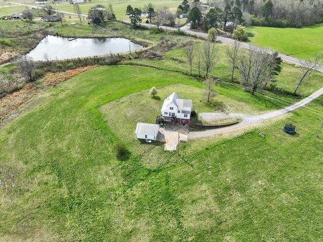 bird's eye view featuring a water view and a rural view