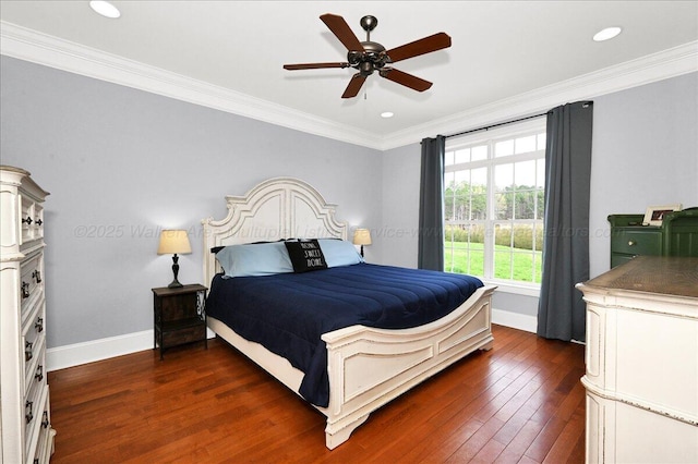 bedroom with recessed lighting, ornamental molding, baseboards, and dark wood finished floors