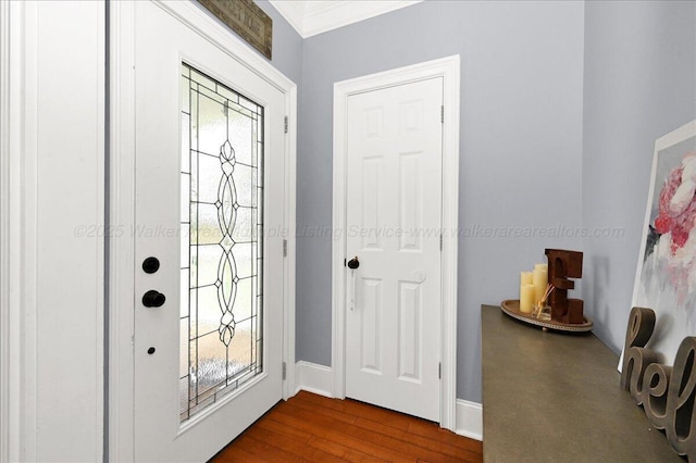 foyer with baseboards and dark wood-style floors