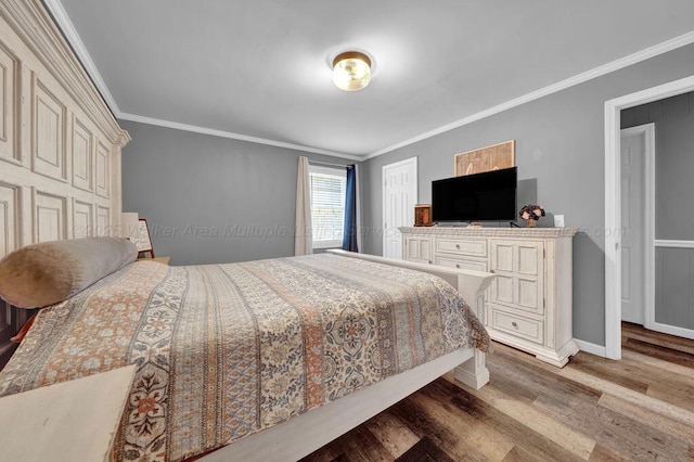 805 3rd Ave, Jasper, AL 35501 - bedroom with wood finished floors and ornamental molding