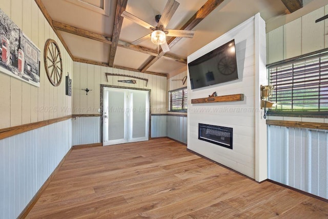 805 3rd Ave, Jasper, AL 35501 - kitchen with coffered ceiling, light wood-type flooring, healthy amount of natural light, a glass covered fireplace, and ceiling fan