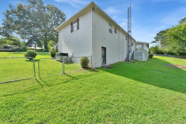 805 3rd Ave, Jasper, AL 35501 - view of side of home featuring a gate and brick siding