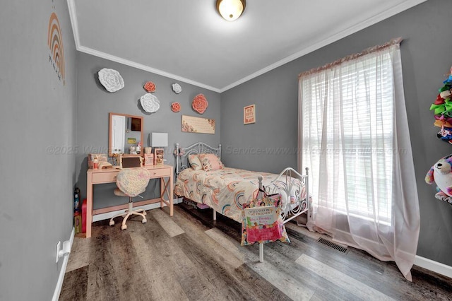 805 3rd Ave, Jasper, AL 35501 - bedroom with multiple windows, ornamental molding, and wood finished floors