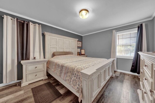 805 3rd Ave, Jasper, AL 35501 - bedroom with ornamental molding and wood finished floors