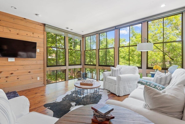 134 Turtle Point Dr, Crane Hill, AL 35053 - living room featuring wood finished floors, wooden walls, and recessed lighting