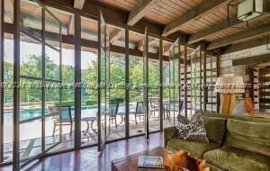 134 Turtle Point Dr, Crane Hill, AL 35053 - common area with a wooden ceiling with exposed beams