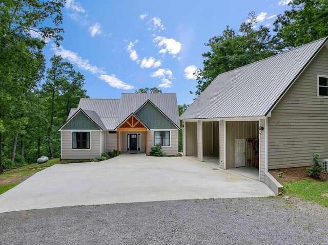 1433 Sipsey Pines Rd, Arley, AL 35540 - view of front of home featuring a metal roof and concrete driveway