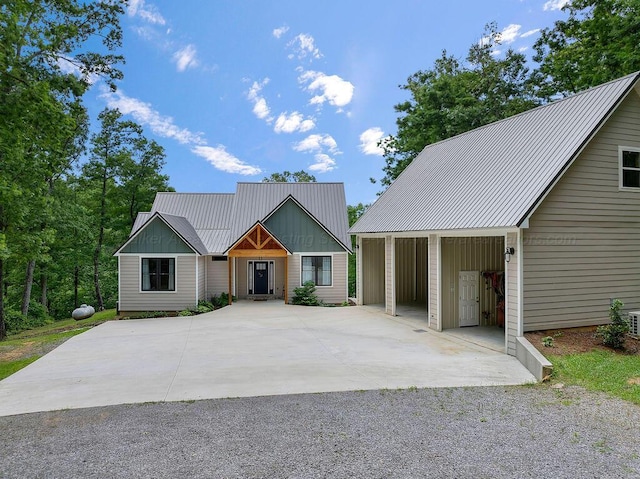 1433 Sipsey Pines Rd, Arley, AL 35540 - view of front facade featuring metal roof and concrete driveway
