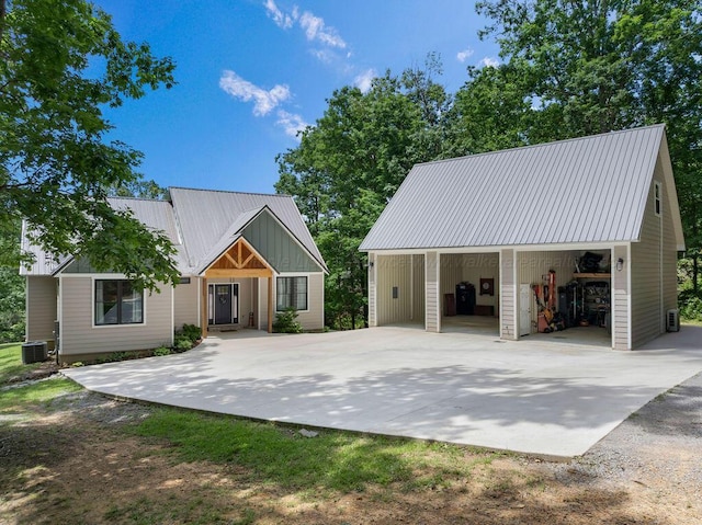 1433 Sipsey Pines Rd, Arley, AL 35540 - view of front of home featuring metal roof, cooling unit, and driveway