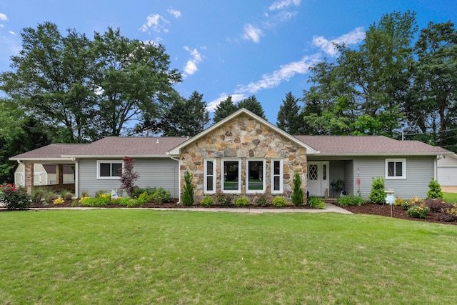 single story home with a front yard and stone siding