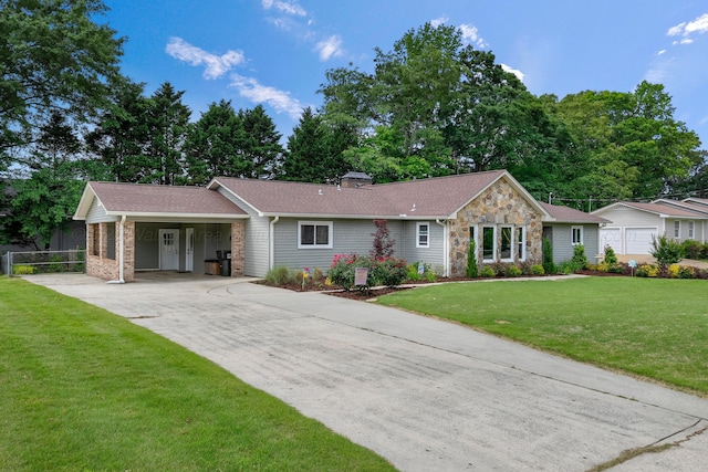 ranch-style house featuring driveway, stone siding, a carport, and roof with shingles