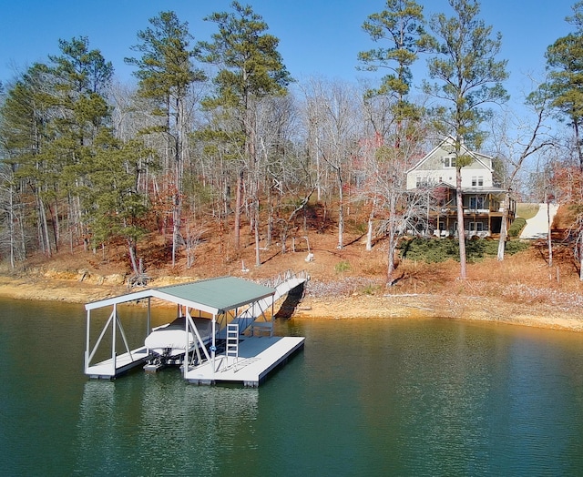 136 Grand Magnolia, Jasper, AL 35504 - rear view of house featuring a patio, a yard, a wooden deck, stairs, and a standing seam roof