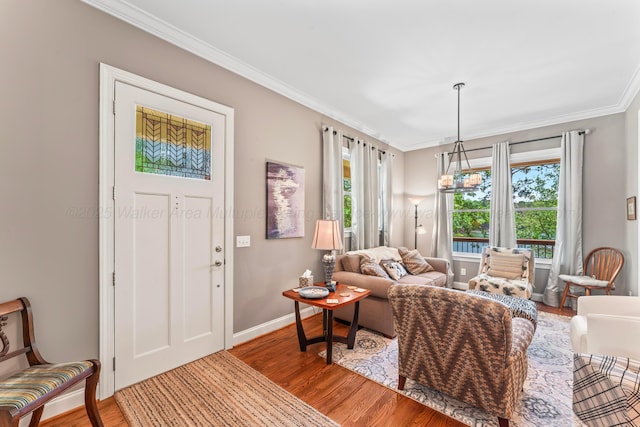 136 Grand Magnolia, Jasper, AL 35504 - living area with wood finished floors, ornamental molding, and baseboards