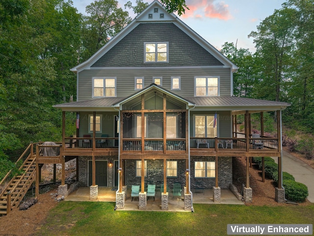 136 Grand Magnolia, Jasper, AL 35504 - dock featuring boat lift, a water view, and view of wooded area