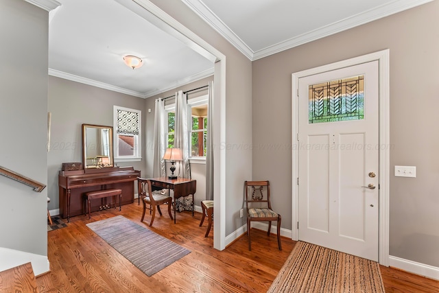 136 Grand Magnolia, Jasper, AL 35504 - entrance foyer with wood finished floors, crown molding, and baseboards