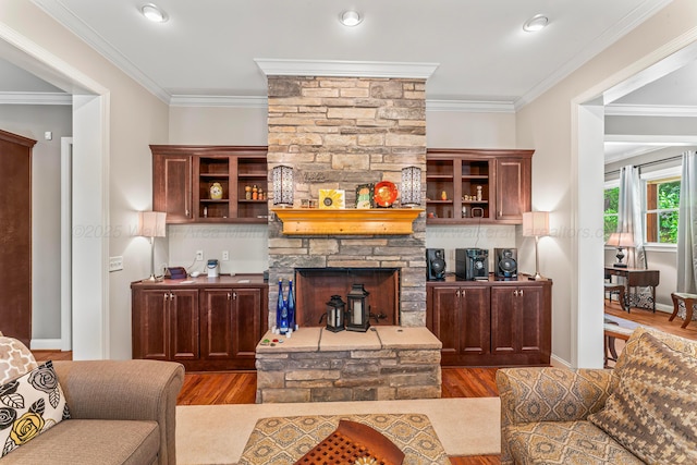 136 Grand Magnolia, Jasper, AL 35504 - living room with crown molding, wood finished floors, and a fireplace