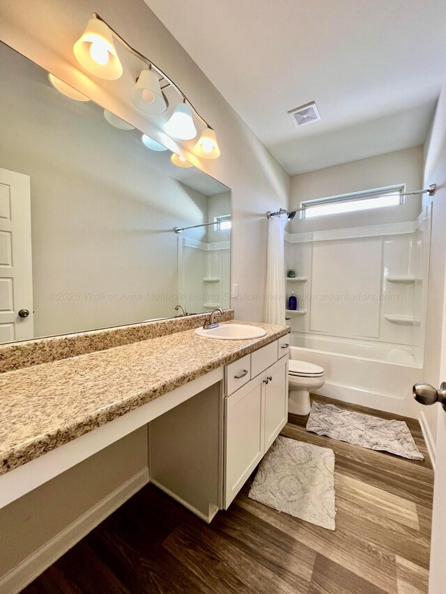 405 Meadow Way, Jasper, AL 35504 - full bathroom featuring shower / bath combo, vanity, and wood finished floors