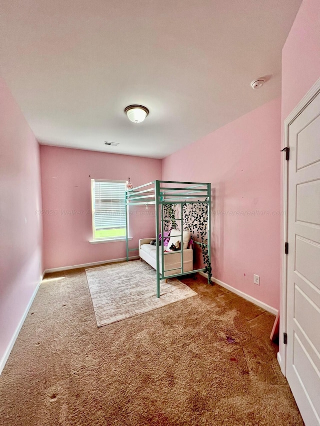 405 Meadow Way, Jasper, AL 35504 - unfurnished bedroom featuring carpet and baseboards