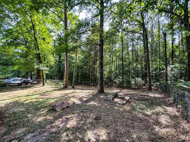 2214 SW 8 Th Ave, Fayette, AL 35555 - view of yard with a forest view
