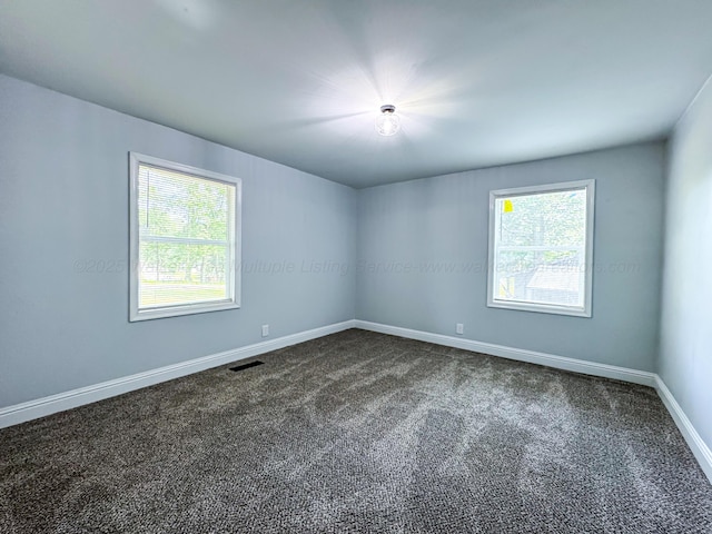 2214 SW 8 Th Ave, Fayette, AL 35555 - unfurnished room featuring dark colored carpet