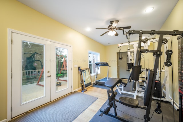 exercise room with french doors, a ceiling fan, wood finished floors, baseboards, and recessed lighting