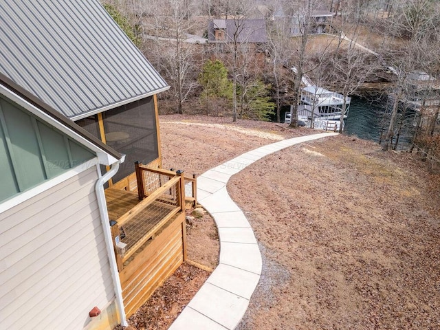 view of yard with a sunroom