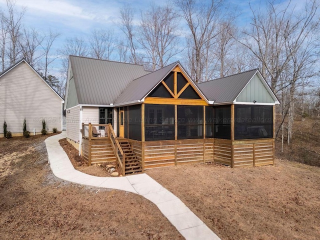 view of front facade featuring a sunroom