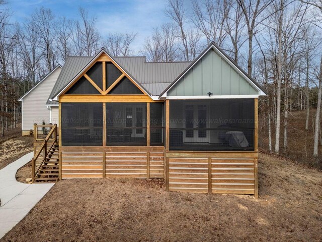 view of front of house featuring a garage and central air condition unit