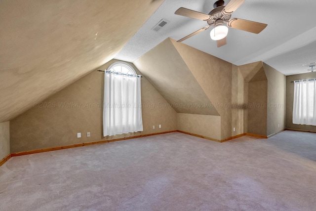 5305 Split Rail Dr, Jasper, AL 35503 - bonus room featuring vaulted ceiling, carpet, and a ceiling fan