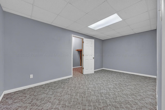 5305 Split Rail Dr, Jasper, AL 35503 - carpeted empty room with a drop ceiling and baseboards