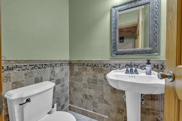 5305 Split Rail Dr, Jasper, AL 35503 - half bath with tile walls and a wainscoted wall