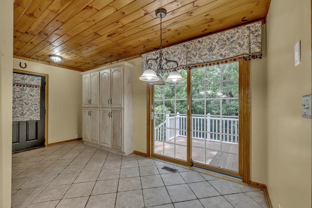 5305 Split Rail Dr, Jasper, AL 35503 - unfurnished dining area with wood ceiling and light tile patterned floors