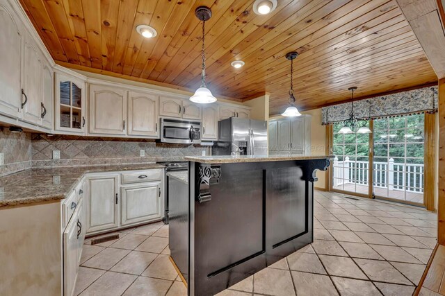 5305 Split Rail Dr, Jasper, AL 35503 - kitchen with appliances with stainless steel finishes, light tile patterned floors, wooden ceiling, glass insert cabinets, and tasteful backsplash