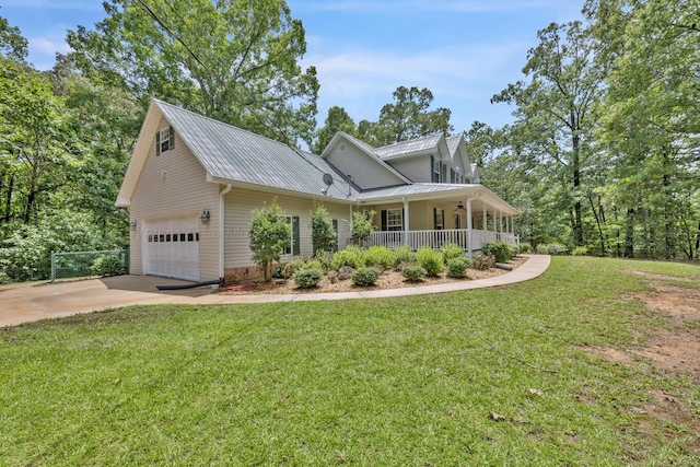 5305 Split Rail Dr, Jasper, AL 35503 - view of front of property with a porch, driveway, a front lawn, and a metal roof