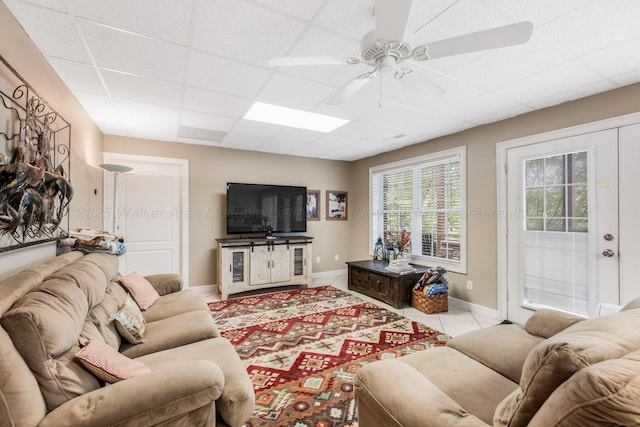 436 Ducktail Rd, Houston, AL 35572 - tiled living room with a ceiling fan, a paneled ceiling, and baseboards
