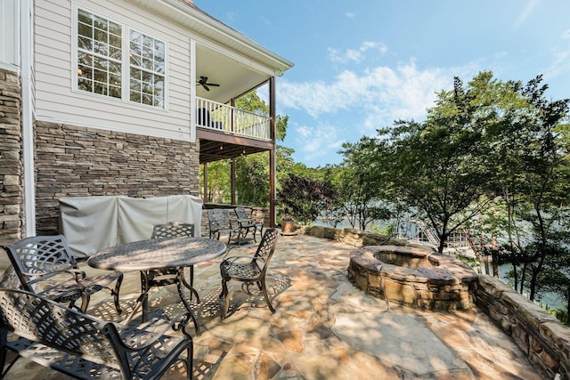 436 Ducktail Rd, Houston, AL 35572 - view of patio with a fire pit, ceiling fan, and a balcony