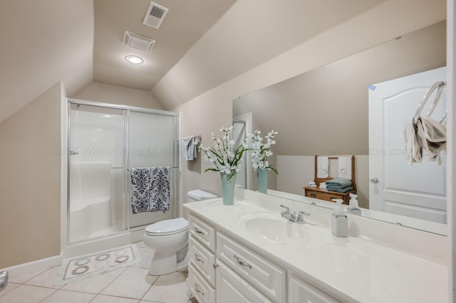 436 Ducktail Rd, Houston, AL 35572 - bathroom featuring vanity, a stall shower, toilet, lofted ceiling, and tile patterned flooring