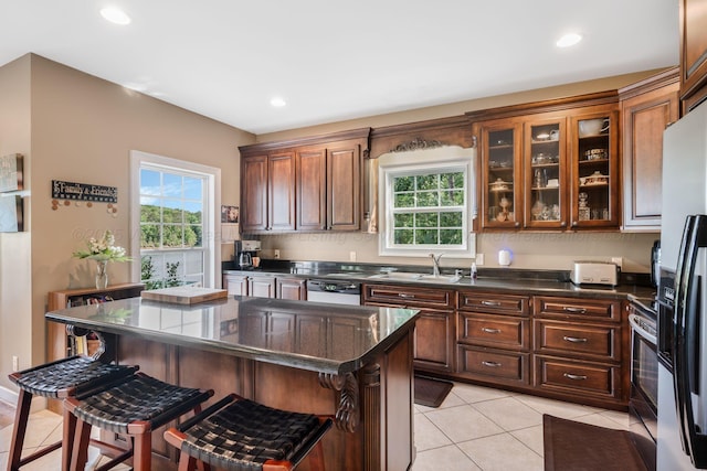 436 Ducktail Rd, Houston, AL 35572 - kitchen featuring a sink, stainless steel appliances, a breakfast bar, plenty of natural light, and recessed lighting