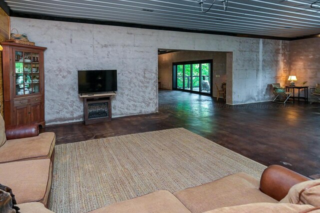 178 Turtle Ln, Houston, AL 35572 - living room with a fireplace and concrete flooring