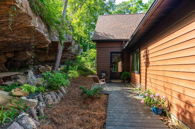 178 Turtle Ln, Houston, AL 35572 - view of property exterior with a shingled roof and a deck