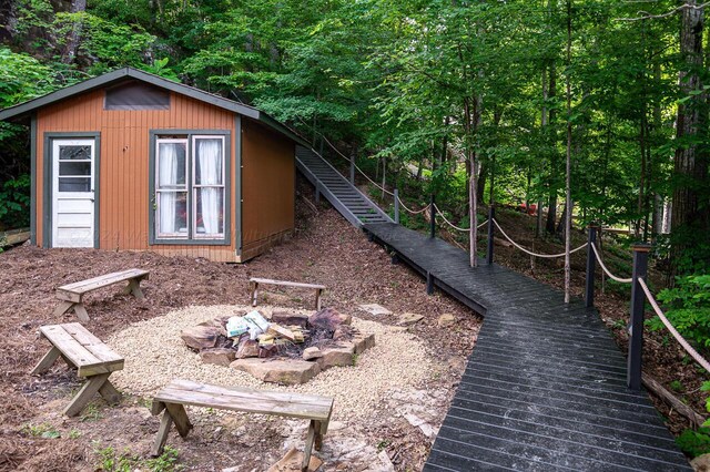 178 Turtle Ln, Houston, AL 35572 - view of shed with a fire pit