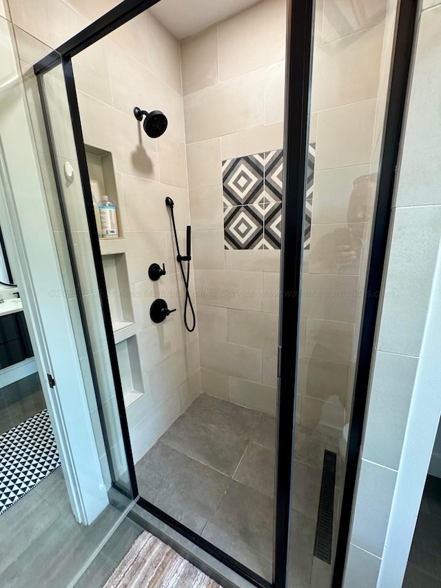 bathroom with a stall shower