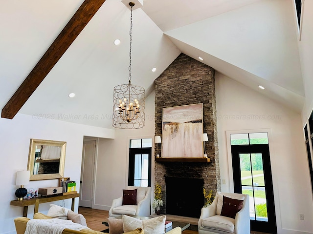 living area featuring a wealth of natural light, recessed lighting, and high vaulted ceiling