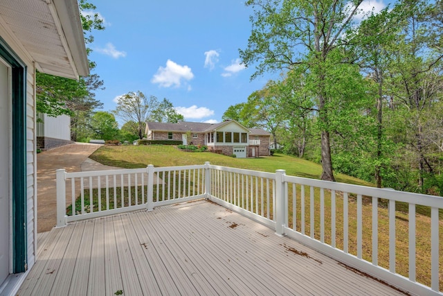 wooden deck with a yard
