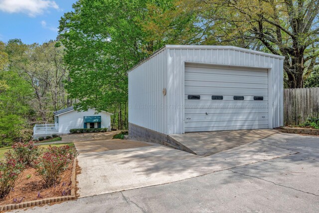 detached garage with fence