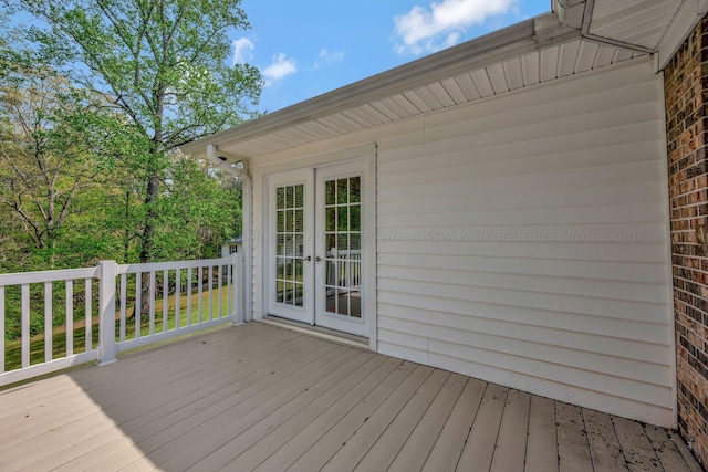 wooden terrace featuring french doors