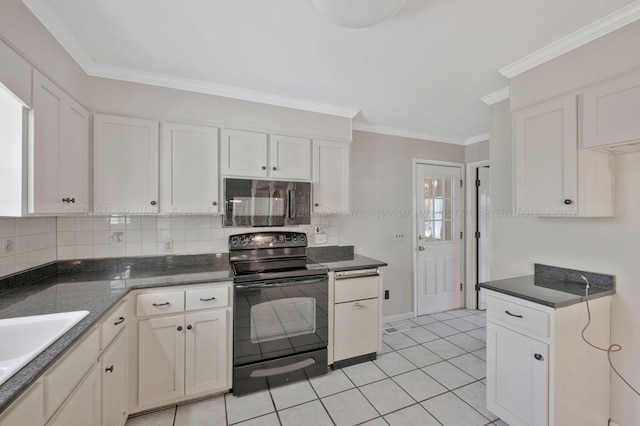 kitchen featuring black appliances, decorative backsplash, crown molding, and white cabinetry