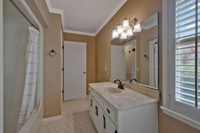 bathroom with tile patterned floors, baseboards, vanity, and crown molding